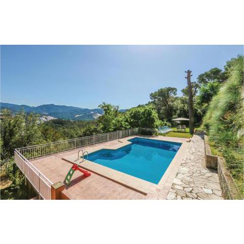 Amazing home in St Cebria de Vallalta with 4 Bedrooms, WiFi and Outdoor swimming pool