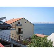 Apartments with a parking space Senj - 15376