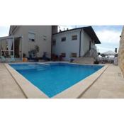 Apartments with a swimming pool Novi Vinodolski - 2419
