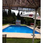 Chalet con piscina privada y Barbacoa