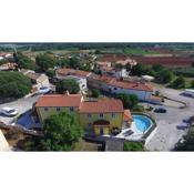 Complex of 2 villas Mugeba III with 2 private pools for up to 16 persons in Porec near the Aquapark