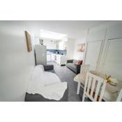 Cozy studios available for short term stays 10 mins from the city! Free WIFI &50