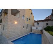 Family friendly apartments with a swimming pool Postira, Brac - 10271