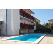 Family friendly apartments with a swimming pool Pula - 7610
