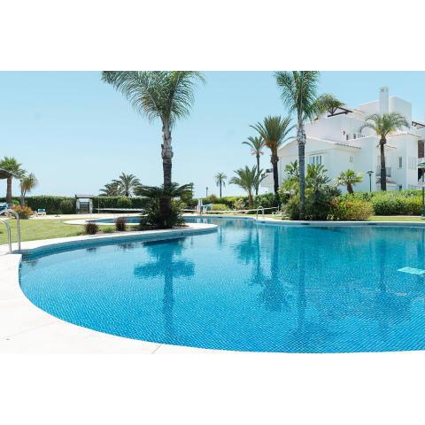 Front-line garden apartment in Palm Beach, Marbella