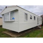 Little Heaven self-catering caravan in Church Farm Holiday Park