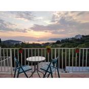 Lovely split level apartment with sea view, pool, free parking and WiFi