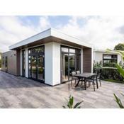 Stylish chalet with a dishwasher, in a holiday park at a recreational lake