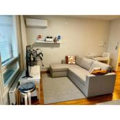 Top floor flat with sauna, A/C & free parking