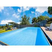 Villa with above ground swimming pool in the rolling Tuscan hills with a beautiful view